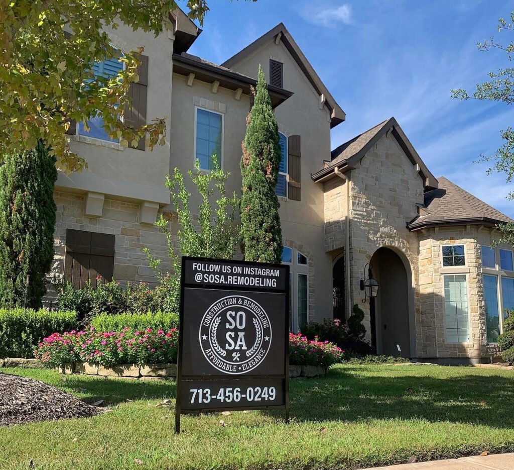 A SOSA Construction & Remodeling yard sign displayed in front of a completed Houston-area home renovation.